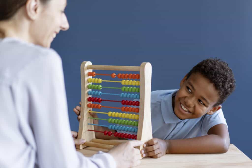A boy enjoys ABA therapy that his parents discovered through Lexington’s Areas served.